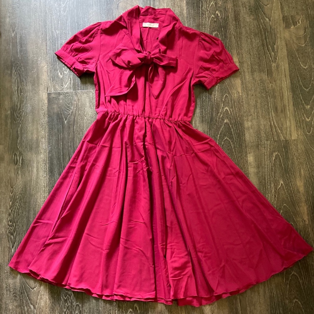 Vintage style berry colored midi dress with bow